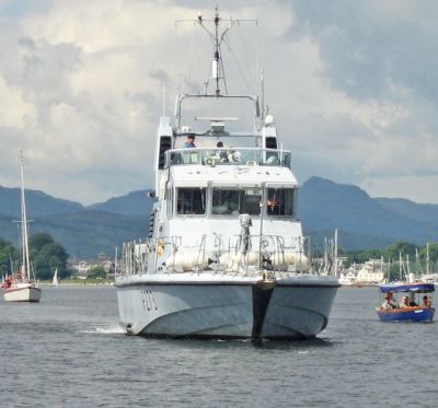 Little and large
HMS Pursuer, a patrol boat from the Clyde Naval Base at Faslane, led the nautical procession from Rhu Marina to Helensburgh pier for the bicentenary celebrations on Saturday August 4 2012. Photo by Kenneth Speirs.
