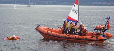 Rescue boat
The Rhu RNLI rescue boat gave a demonstration of a rescue as part of the bicentenary celebrations off Helensburgh pier on Saturday August 4 2012. Photo by Kenneth Crawford.
