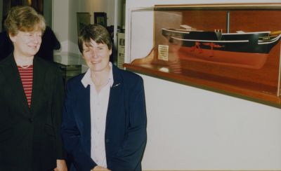 Model gifted
Mrs Mary-Pat Smith and Mrs Nancy Jackson, daughters of Helensburgh's last Provost, Norman M.Glen CBE, with a model of the Comet they presented to Helensburgh Library at the opening of the 2002 Bell Exhibition organised by Doris Gentles as part of the burgh bicentenary celebrations.
