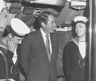 Star Guest
Film star Gregory Peck chats to two ratings on a visit to the Faslane Polaris submarine HMS Repulse. Date unknown.
