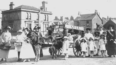 Heather Day
Supporters of the Society for the Prevention of Cruelty to Children take a Heather Day collection in Colquhoun Square in September 1918. The message of the trays reads: â€œSend Good Luck to your Friends at the Frontâ€.
