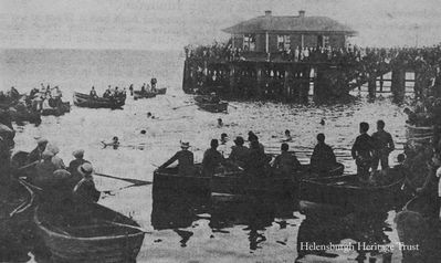 1921 Swimming Gala
The Meechan brothers took this picture of crowds watching a swimming competition on a June Saturday on the east side of Helensburgh pier, 18 years before the town's outdoor swimming pool opened. Some of the boats are the town's old jollyboats, which used to be laid up beside the East Esplanade.
