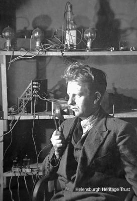 Transatlantic transmission
An October 3 1929 newspaper image of John Logie Baird and his TV equipment. The caption on a companion picture stated: "One more dream of science has been realised. Man's vision has spanned the Ocean, and transatlantic television has been demonstrated to be a reality. A man and a woman sat before an electric eye in a London laboratory last night, and a group of people in a darkened basement in the village of Hartsdale, New York, watched them turn their heads and move from side to side. The images were crude and broken, but they were images nevertheless."

