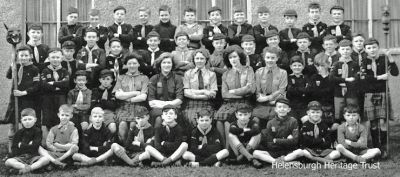 3rd Helensburgh Cubs
A 1946 group of Helensburgh Cubs. Top row (from left): Teddy McEwan, Jim Steel, Jim Spence, Norman Fagan, Billy Dixon, Robert Watt, Gordon Hamilton, Sandy Wright, ?, Robin Adair, Cosmo Fraser, Gordon Grant; second row: Scott Milne, Jim Aitken, John Oswald, Graham Scott, Charlie Dickens, ?, Gordon Peebles, Tony McAuley, Alister McLeod and (first name unknown) Norvel, Jim Kennedy, Robert Burns; third row: Willie Thomson, Hugh Abraham, Billy Campbell, Campbell Jardine, Mary Brough, ?, Miss Murdoch, ?, ?, Gordon Fraser, Clark Gibson, Douglas Lamb, Leo Hendry; front row: Tony Wright, Sandy Peters, Angus Tran, Jim Campbell, Jim McNeil, Donald Cameron, Iain Campbell, Kenneth Gibson, ?, David Griffith. Image supplied by Gordon Fraser.
