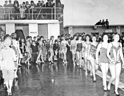 Beauty Contest
Entrants for the 1962 Helensburgh Beauty Contest parade at the outdoor pool on a wet and cold September day.
