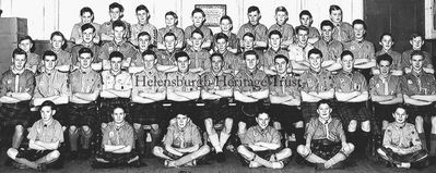 3rd Helensburgh Scouts 1956
Back: D.Cairns, A.Glendye, N.McLeod, J.Thomson, ?, G.Snedden, ?, ?, K.Mercer, R.McLean; next: I.Allan, W.Clelland, P.Devenny, G.Tran, A.Brabender, W.Wilson, F.Gilmour, W.Freeland, C.Sutherland, T.Allan, ?, J.West, Ian McLeod, T.Wright, ?; seated: G.Marsland, G.Cleary, Iain McLeod, W.Campbell, J.Steel, I.Sutherland, J.D.McKerrel, A.Wright, S.Douglas, A.Wright, W.Harvey, R.Higgins, A.Tran; front: I.Cairns, I.Mercer, ?, A.Thomson, I.Donaldson, J.Douglas. Photo by Bill Benzie, supplied by Gordon Tran.
