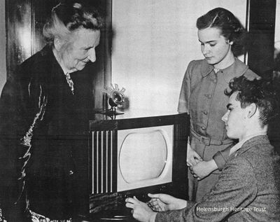 Presentation to family
John Logie Baird's sister Annie and his children Diana and Malcolm are presented with a television set from the Scophany Television Company in April 1952.
