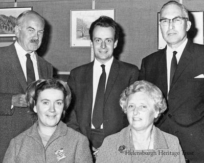 Art Show opening
The opening of Helensburgh and District Art Club's 16th annual exhibition in the Victoria Hall in September 1967. Standing are club president and prominent local artist Gregor Ian Smith, Scottish Arts Council assistant director William Buchanan who opened the show, and exhibition convener J.W.Norman. In front are Mrs Buchanan and club secretary Mrs Janet Stirling.
