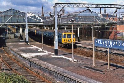 Helensburgh Central
A 1975 view of Helensburgh Central Station with a Blue Train at the platform. Image copyright David Christie, supplied by Nottingham Heritage Vehicles.
