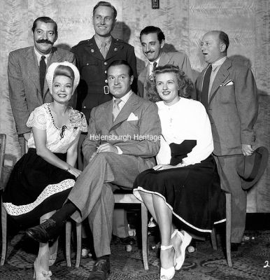 Bob Hope at Rosneath
Hugely popular American entertainer Bob Hope visited United States Navy Base Two at Rosneath with a concert party in 1945, including Frances Langford and Jerry Colona. This picture was taken at a post-show party at the Princess Louise Officers Club, the Ferry Inn. Image supplied by Dennis Royal, author of the book 'United States Navy Base Two â€” Americans at Rosneath 1941-45'.
