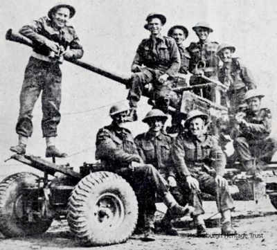 Bofors crew
World War Two soldiers from Helensburgh pose on a Bofors gun. they are sergeant Ian Somerville, Bombardier James Proudfoot, Lance Bombardier William Colquhoun, Lance Bombardier Dennis Mundie, Lance Bombardier McInnes, Gunner R.Belshaw, Gunner David Hosie, Gunner John Thomson, Gunner James Rea. Image supplied by Malcolm LeMay.
