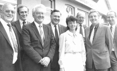 Day of the Sale
This was taken outside the Helensburgh Advertiser's East King Street premises in 1985 on the day the weekly newspaper was sold to Express Newspapers. It shows (from left) Helensburgh man Ronnie Fowler of Express Newspapers, an Express executive, founder Craig Jeffrey, Sir David McNee, Advertiser chief cashier Mrs Freda Aram from Garelochhead, another Express executive, co-owner Ronnie Jeffrey, and managing editor Donald Fullarton.
