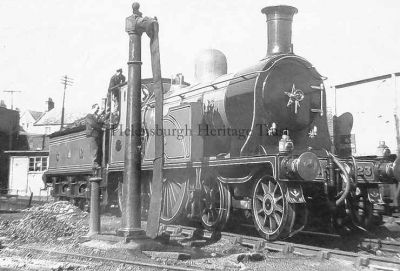 Caledonian no.123
Caledonian locomotive no.123 pictured at the Helensburgh engine depot in 1948 during an excursion to mark the centenary of the Caledonian Railway. Built by Neilson & Co. in Springburn in 1886, she won a gold medal at the Edinburgh International Exhibition that year. In regular service, no.123 worked on the 101-mile Carlisle to Edinburgh section of the west coast route. She was withdrawn in 1935 and is now an exhibit at Glasgow's Transport Museum. Image supplied by the photographer, Donald McAllister.
