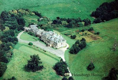 Camis Eskan House
An aerial view of Camis Eskan House, circa 1972, when it was in use as a hospital. The main part was built in 1648 by the Dennistouns, who had a royal connection through marriage. In 1836 the mansion was sold to Colin Campbell from Renfrewshire, and his descendants owned it until November 1946 when it was bought by the then Dunbartonshire County Council. Well known Helensburgh architect A.N.Paterson was commissioned by the then tenant, lawyer Leonard Gow, to modernise and extend the building in 1915. During the Second World War it was requisitioned by the Government and used as a hospital for Polish Army casualties, then rented to the County Council for use as a hospital for, first, TB patients, then infectious diseases, then maternity, and finally geriatric use. In 1979 it was developed for private flats and dwellings. Image supplied by Robert Reid.
