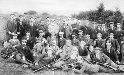 Cardross 'B' Company Volunteer Forces 1901
Back: W.Smith, J.Adamson, R.Boyd, P.Scott, W.Munro, J.J.McIntyre, G.Boyd, H.Purdie, G.McIntyre, J.Gallacher, unknown. 2nd back: J.Coleman, P.Wilson, W.Irvin, Colour Sgt Penland, Major J.McIntyre, W.Jackson, Captain Roxburgh, W.Purdie, D.Brown, unknown. Seated: W.Logan, J.McFarlane, J.Boyd, J.Davie, J.Brown, E.Hutchison, W.Hutchison, A.Boyd, J.Davie, W.Adamson, A.Campbell, J.Fairley, A.McIntyre, J.Glen, J.Graham, N.Coleman, P.Wilson. Front: W.Bain, H.Coleman, H.Larkin, A.Miller, A.Campbell. At Auchencarroch.
