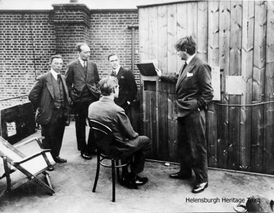 Daylight TV
Daylight TV at Long Acre in 1930, with John Logie Baird on the right.
