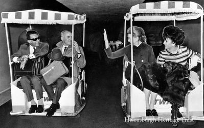 Deborah Kerr and Elizabeth Taylor
Helensburgh film star Deborah Kerr and her second husband, writer Peter Viertal, are seen with Elizabeth Taylor and her husband Richard Burton on board carts at New York's Kennedy Airport on November 15 1967 on their way to Los Angeles. This Associated Press wirephoto has been slightly touched up for publication to ensure that the couples stand out from the dark background.
