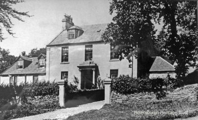 Dunmore House, Rhu
An old image of Dunmore House which stood beside Pier Road, Rhu, and opposite Rhu Pier. The last owner of the house was a recluse who allowed the building to deteriorate to such an extent that latterly he was living in a tent inside one room because the roof was leaking so badly. It was demolished in the 1970s and replaced by two matching modern houses, Dunmore East and Dunmore West. Image by courtesy of Jim Shields.
