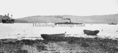 Gareloch Steamer
A steamer enters the Gareloch after passing the Training Ship Empress moored off Kidston Park. Circa 1920.
