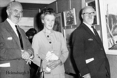 Art Show opening
Guest of honour Hugh Adam Crawford RSA (right) with his wife and local artist Gregor Ian Smith, president of Helensburgh and District Art Club, at the opening of the club's annual show in the Victoria Hall in September 1968.
