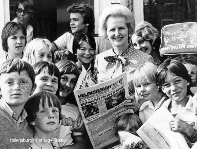 PM in Churchill
Prime Minister Margaret Thatcher is seen visiting and meeting children at the naval married quarters estate at Churchill, Helensburgh, in 1976. Photo by Brian Averell for the Helensburgh Advertiser.
