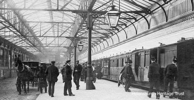 Helensburgh Central
Passengers board a train at Helensburgh Central Station, possibly circa 1890.The photo was taken for Macneur & Bryden Ltd., stationers and publishers of the Helensburgh and Gareloch Times weekly newspaper, whose premises were in East Princes Street opposite the station.
