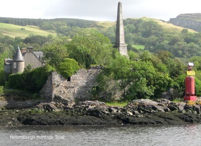 The Bowling Obelisk
This memorial to Henry Bell, erected in 1839, stands in the grounds of the semi-derelict Dunglas Castle, which is within a secure area owned by Esso to which entry cannot be obtained. This image was taken by Heritage Trust chairman Stewart Noble while on board the paddle steamer Waverley in 2011.
