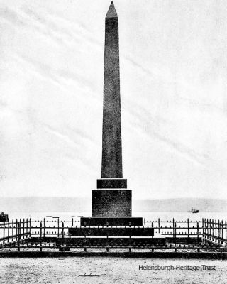 Bell obelisk
The Henry bell obelisk on West Clyde Street before the railings were removed for the war effort in World War Two. Image date unknown.
