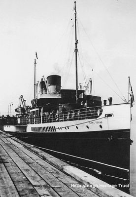 Jeanie Deans at Craigendoran
The paddle steamer Jeanie Deans was built by Fairfield at Govan and launched in 1931, then extensively refitted after war service. She remained a passenger favourite on cruises from Craigendoran until the end of the 1964 season. The next year she went to the Thames and was renamed 'Queen of the South'. She was broken up in Antwerp, Belgium, in 1967. Image circa 1949.
