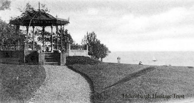 Kidston Park Bandstand
An illustration from the front of a Christmas card looking east towards the now demolished bandstand in Kidston Park, circa 1902. Bought from the Duke of Argyll in 1877 for Â£650 by William Kidston with help from Sir James Colquhoun and others, Kidston Park was formerly named Cairndhu Point â€” known locally as Neddy's Point after a well known fisherman and ferryman who lived nearby â€” but was renamed Kidston Park from 1889 when Mr Kidston left money to support its maintenance.
