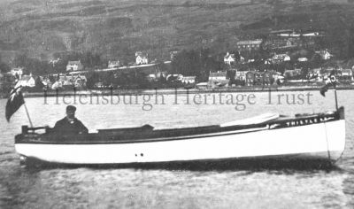 Motor Boat Thistle
The Thistle and helmsman are pictured in the Gareloch opposite Garelochhead, circa 1920.
