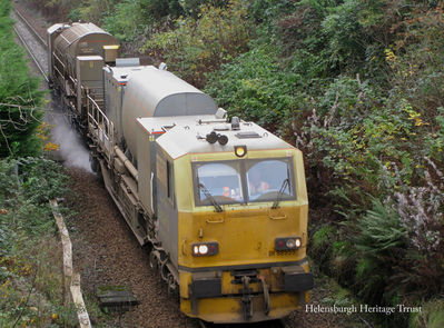 Leaf-clearing train
A view from the Sinclair Street railway bridge in Helensburgh looking east as a leaf-clearing train climbs the hill from Craigendoran. These trains runs every autumn to blast leaves clear of the railway line to increase the adhesion of trains to the track. Image taken on November 2 2011 and supplied by Stewart Noble.
