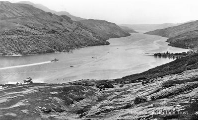 Loch Long Torpedo Range
This picture, circa 1950, shows the Loch Long Torpedo Range which was in use from 1912-86. The building was badly damaged by fire and demolished in 2007. Activity at the range reached a peak during World War Two, with more than 12,000 torpedoes being fired down the loch in 1944. 
