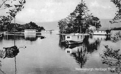 Houseboats at Luss
Houseboats moored opposite Aldochlay, near Luss, on Loch Lomond. Opposite is Swan Island. Image date unknown.
