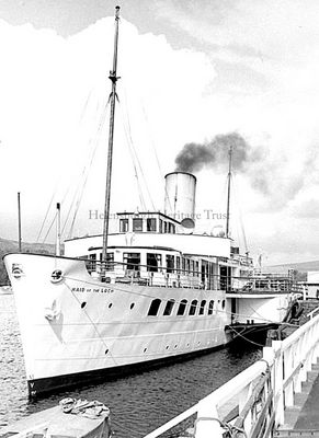 Maid of the Loch
A Hector Cameron photo of the Maid of the Loch at Balloch Pier in August 1970. The 555 ton vessel was the last paddle steamer built in Britain, and the last of a long line of Loch Lomond steamers beginning about 1816. Built by A. & J.Inglis of Glasgow, she was dismantled, shipped by rail to Balloch where the sections were reassembled, and launched on March 5 1953. Her last commercial sailing was in August 1981, and now she is looked after at Balloch Pier by the Maid of the Loch Preservation Society.
