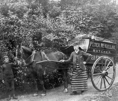 Meat delivery
Helensburgh butcher Peter McKellar, assisted by a young boy, delivers meat to one of the Helensburgh mansions with a rhododendron-ringed drive. Image date unknown.
