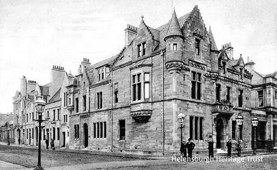 Municipal Buildings
The Municipal Buildings at the junction of East Princes Street and Sinclair Street. They were built in Scots Baronial style in in 1878 by John Honeyman at a cost of Â£6,000, replacing an old theatre which had also served as the Town Hall. In 1906 A.N.Paterson added the Sinclair Street extension in a more restrained Scottish style to house the Police Station and Fire Station. Image circa 1914.
