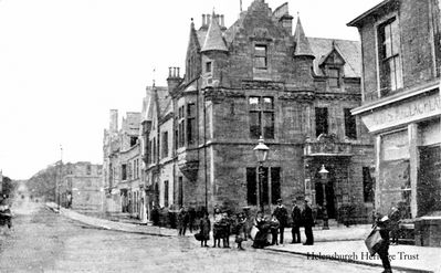 Municipal Buildings
A family pose at the East Princes Street-Sinclair Street junction, in front of Helensburgh Municipal Buildings and beside David S.MacLachlan's bakery. Image circa 1909.
