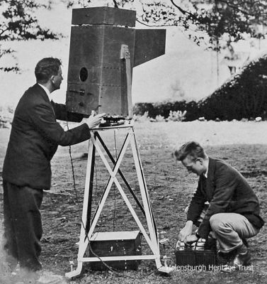 Noctovision
John Logie Baird (left) is seen operating his night vision device, the Noctovisor, on Boxhill in Surrey in 1929. It was slung on gimbals and rotated about a circular compass scale, and was said to be able to pick up a ship's lights in fog and give a compass bearing, or televise people who were in complete darkness.
