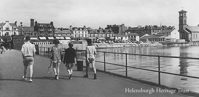 Pier stroll
Strolling back up Helensburgh pier, circa 1960, are Stewart Noble (now chairman of Helensburgh Heritage Trust), Lesley Marshall (now Mrs Lesley Kennedy), Jennifer Taylor (now living in Canada), and a visitor from France.

