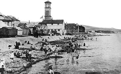 Seafront looking east
This view eastwards from the pier shows a busy beach, the bandstand, shows, the Granary and the Old Parish Church, with the Queen's Hotel in the distance. Image date unknown.
