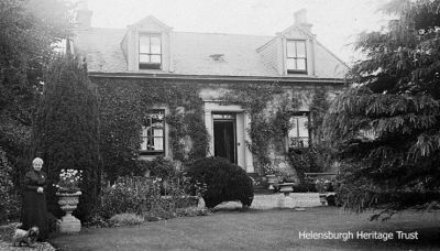 Mystery House
A July 1905 image which shows Mrs Smith and her dog Top outside their house, possibly at Portincaple. More information welcome.
