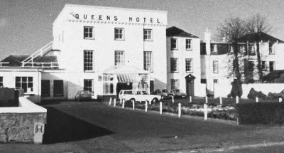 The Queen's Hotel
Originally the Baths Hotel and home of Helensburgh's first Provost, steamship pioneer Henry Bell, the Queen's Hotel was built by Bell in 1806. It was converted into flats in the mid-1980s. In front of the front door is the Volvo estate car used for many years by the last manager, Norman Drummond. Image date unknown.
