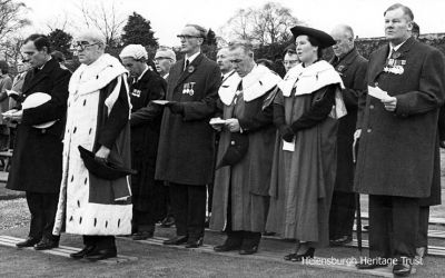 Remembrance Day 1968
The official party at the 1968 Remembrance Day service at the Cenotaph in Hermitage Park. In front are the Commodore Clyde and Provost J.McLeod Williamson. In the row behind are Town Clerk Robert Mackay, Councillor Norman Glen, Bailie John Langan, Bailie Mrs Jae Gardiner, and Councillor Ian Johnston.
