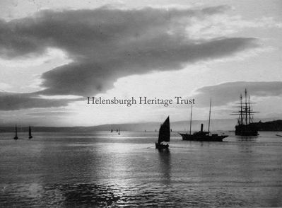 Sunrise at Rhu
The Gareloch and Clyde beyond from Rhu at sunrise, circa 1916. The large vessel on the right is the Training Ship Empress.
