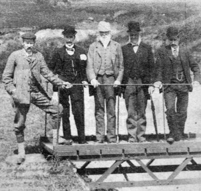 Waterworks trip
Local worthies, including F.C.Buchanan of Rowmore, Rhu (left), celebrate the opening of a new dam and waterworks in the hills above the village, c.1896.
