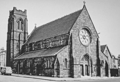 St Michael's Church
Helensburgh's St Michael and All Angels Scottish Episcopal Church stands at the corner of William Street and West Princes Street. On Sunday August 22 1841 a congregation of Scottish Episcopalians met in the room of a house in William Street, where Divine Service was solemnised by the Very Rev William Routledge. Their first church, dedicated to the Holy Trinity, opened on the site of the present St Michael's Church in 1843. Sir Robert Rowand Anderson, a prolific architect and pupil of George Gilbert Scott, chose the style of the Gothic Revival for the current church which was consecrated on May 7 1868. it is Helensburgh's only grade A listed church. Photo by Professor John Hume.
