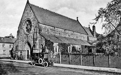 St Michael's Church
Sir Robert Rowan Anderson, a pupil of George Gilbert Scott, designed St Michael and All Angels Scottish Episcopal Church, at the corner of William Street and West Princes Street, and maintained an interest in the subsequent decorative additions. Amongst the important contributors to the cost of its erection in 1867 was William Gladstone. Image published by M.C.Robertson, West End Library, Helensburgh, circa 1912.
