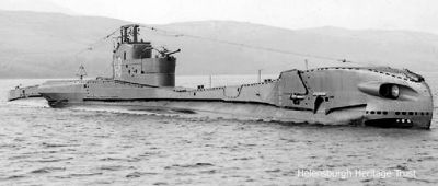 HMS Traveller
The Royal Navy T class submarine Traveller in the Gareloch in April 1942. Built by Scotts of Greenock and launched in August 1941, Traveller spent most of her career in the Mediterranean. She was unsuccessful in most of her attacks, sinking the Italian merchantman Albachiara, but launching failed attacks against the Italian merchant ship Ezilda Croce, the Italian 'small light cruiser', the Italian tanker Proserpina and the Italian torpedo boats Castore and Ciclone. Traveller left Malta on November 28 1942 for a patrol in the Gulf of Taranto. She carried out a reconnaissance of Taranto harbour for a Chariot human torpedo attack, but never returned and is presumed to have hit a mine.
