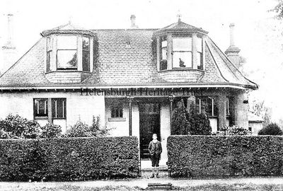 Baird's childhood home
Helensburgh-born TV inventor John Logie Baird poses outside the family home, The Lodge, in West Argyle Street, in 1900.
